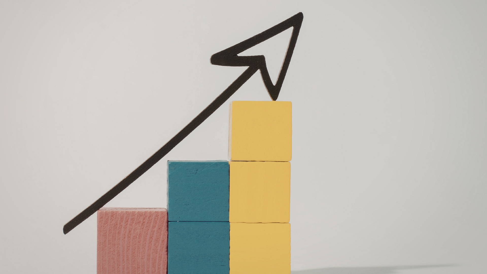 bar graph with arrow going upward in color