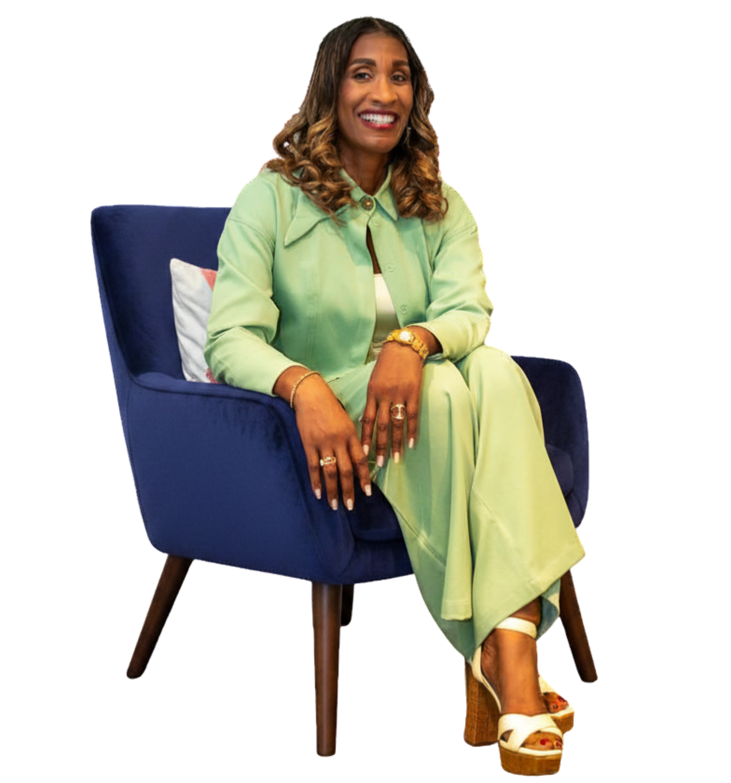 Virnitia sitting in a blue chair